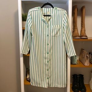 French Fact Vintage dress from the 80s. Size small. Padded shoulders.